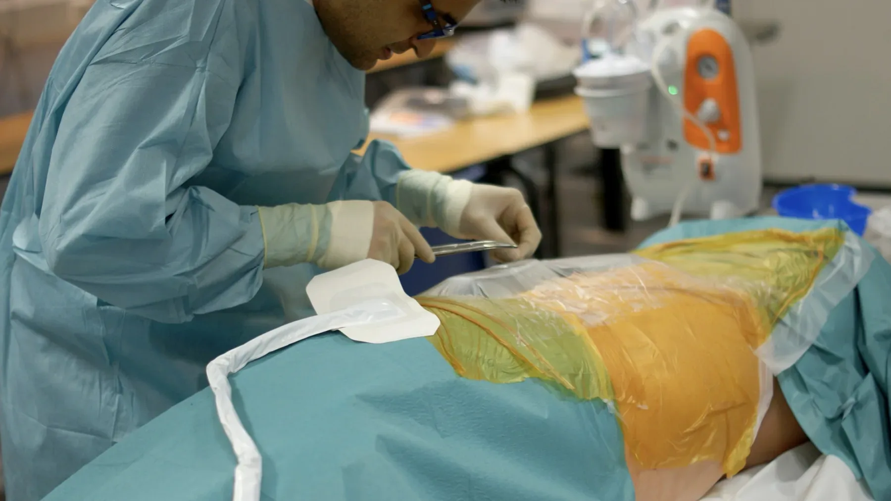 Surgeon performing usability test on patient simulation model